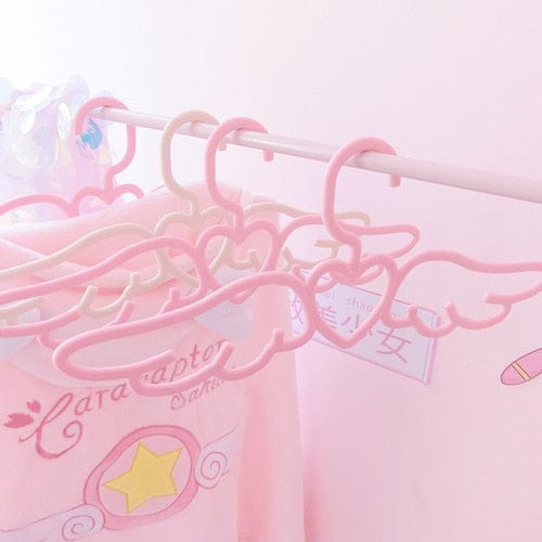 Set of 5/10 hangers in the shape of a winged heart