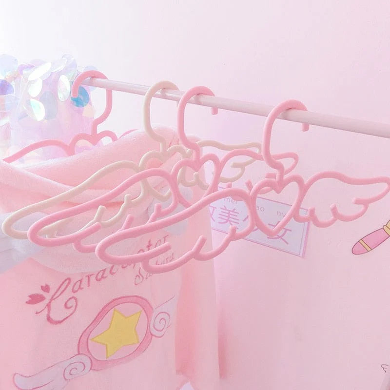 Set of 5/10 hangers in the shape of a winged heart