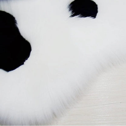Tapis moelleux en forme de patte de chat