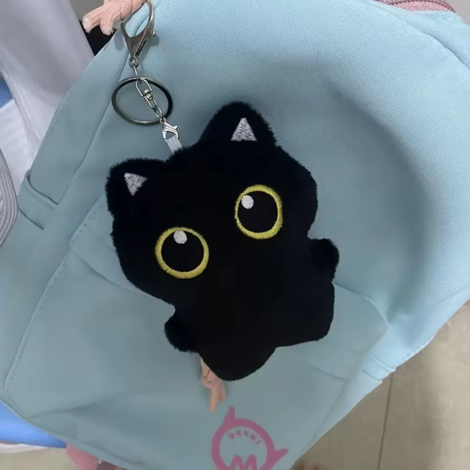 Peluche porte-clés chat noir avec gros yeux